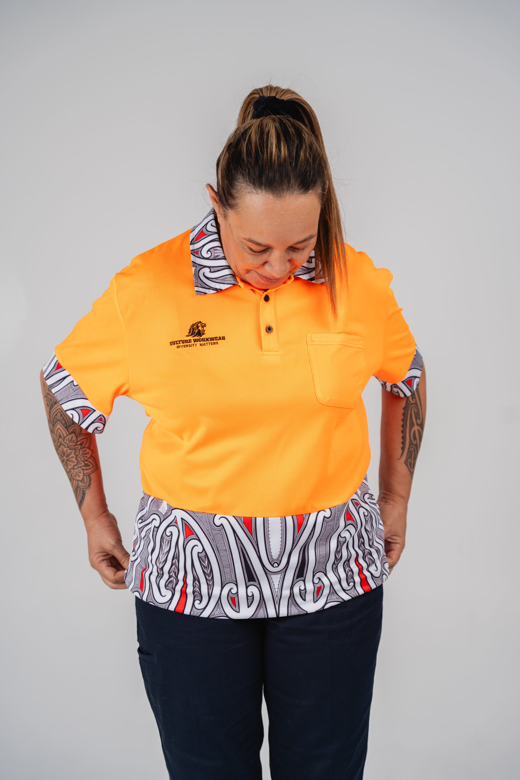 Māori Orange Polo Hi-Vis - Image 2